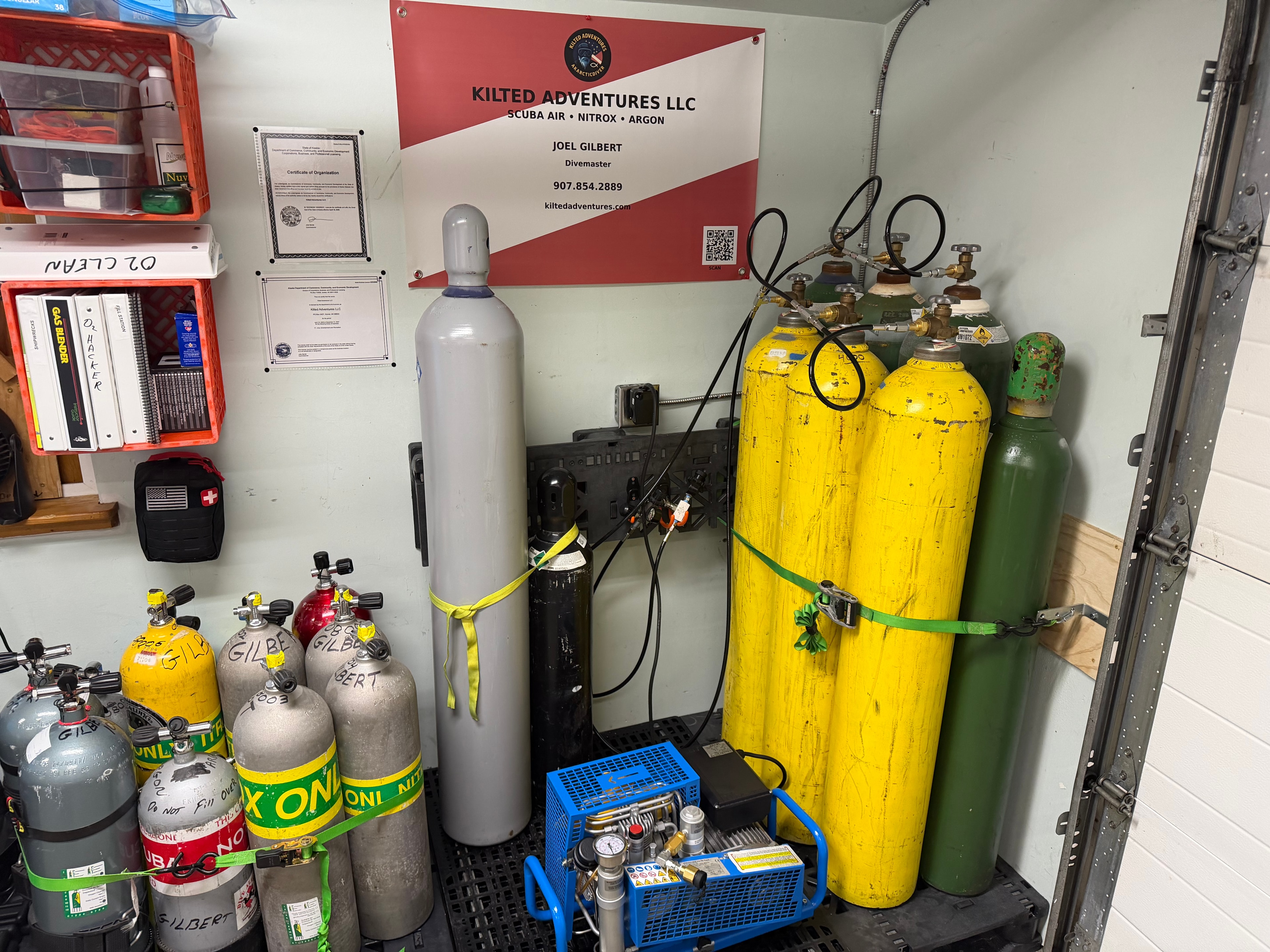 Kilted Adventures fill station — tanks, compressor, and certifications
